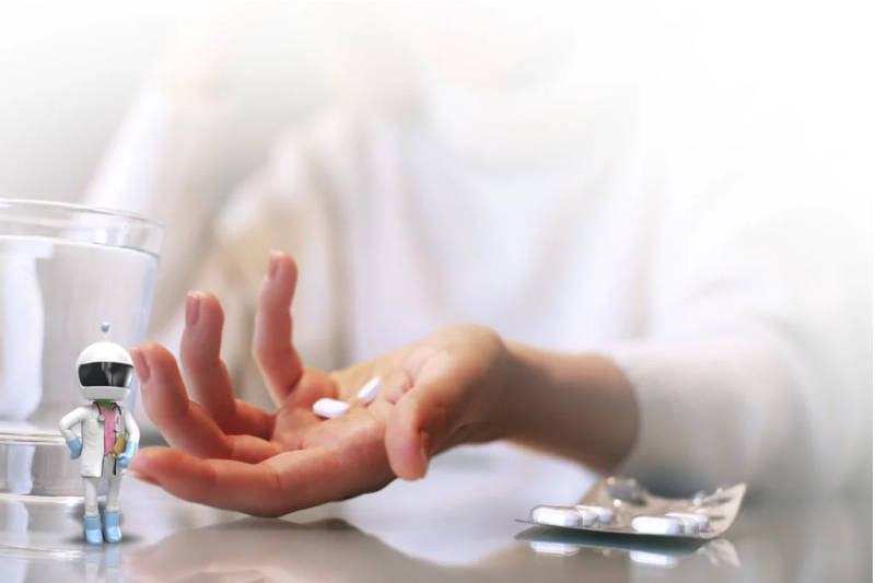 a persons hand holding medication 